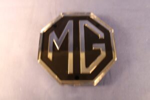 (13) MGB & MIDGET 34G252 PLASTIC OCTAGON BOOT/ TAILGATE BADGE