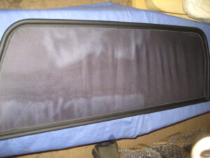 MGB ROADSTER BLACK LEATHER COVERED MESH WINDSTOP 458-328