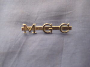 AHC76 MGC ROADSTER BOOT BADGE MGC ON A BAR INC GROMMETS
