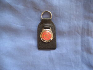 GAC4035 MIDGET BLACK LEATHER KEY FOB WITH RED AND BLACK LOGO MIDGET KEY RING