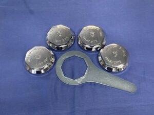 SPIN5SP SET OF 4 OCTAGON MG LOGO WIRE WHEEL SPINNERS 8TPI INC SPANNER