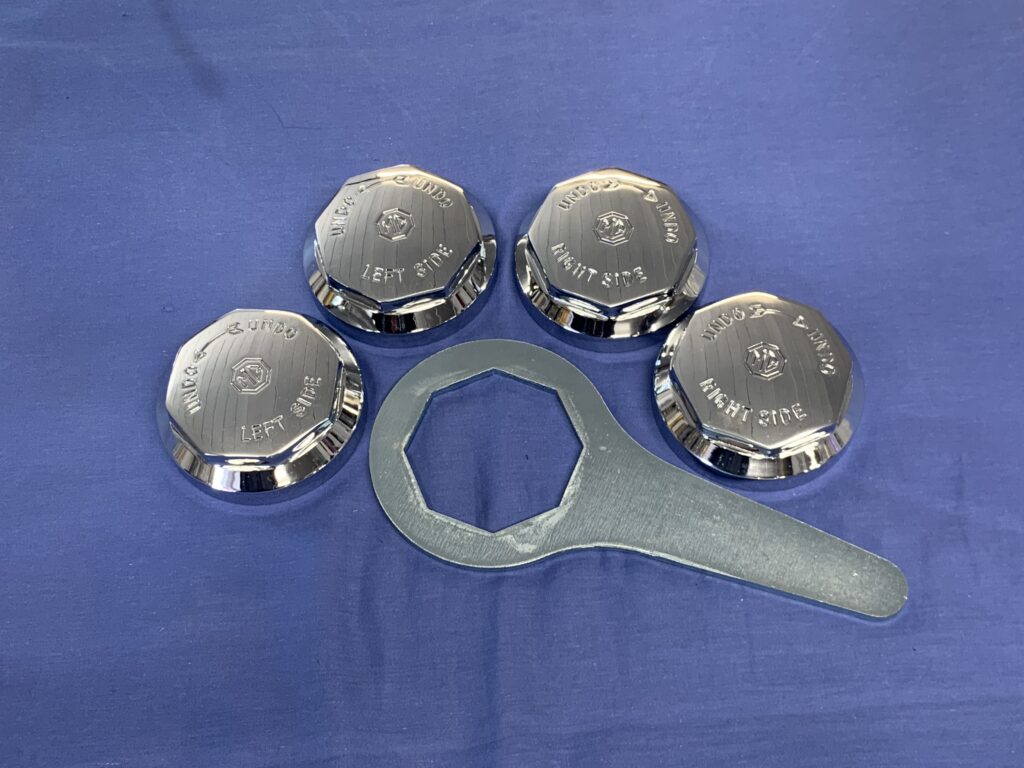 SPIN5SP SET OF 4 OCTAGON MG LOGO WIRE WHEEL SPINNERS 8TPI INC SPANNER