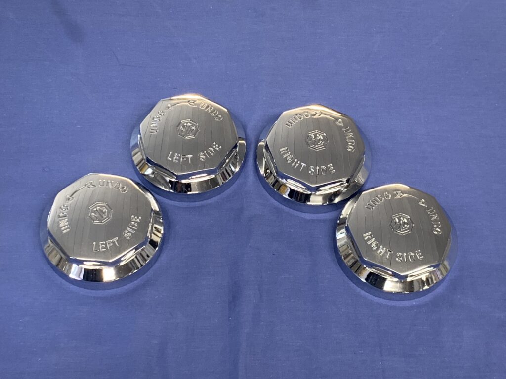 SPIN5 SET OF 4 OCTAGON MG LOGO WIRE WHEEL SPINNERS 8 TPI